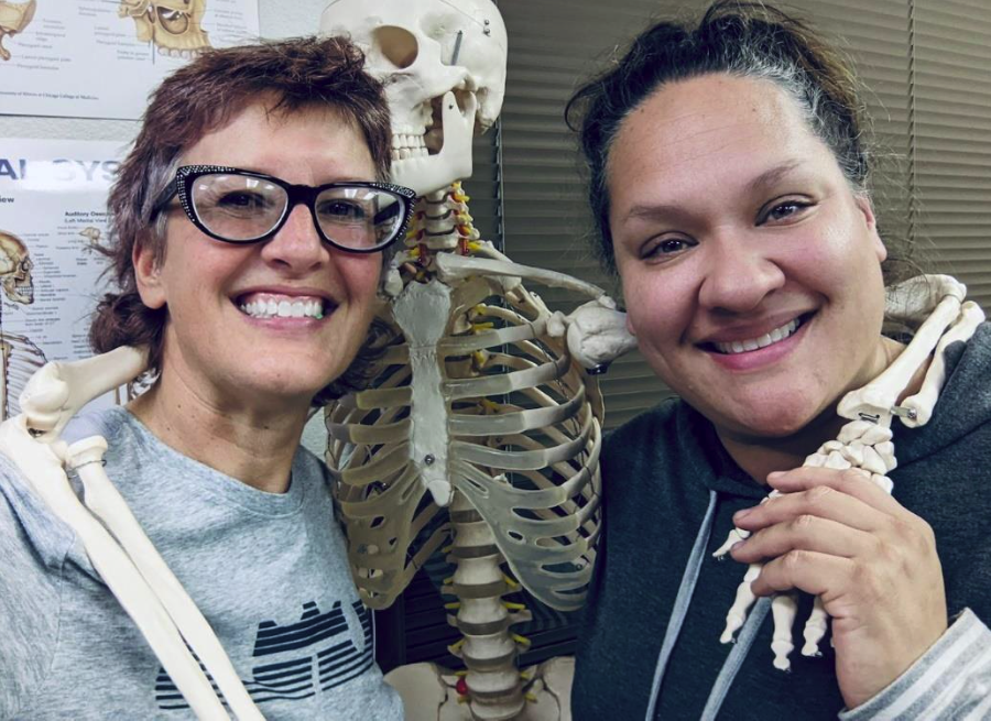 Massage therapy Instructors with skeleton model